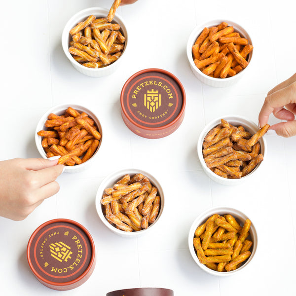 Assorted pretzel flavors separated into bowls